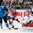 MINSK, BELARUS - MAY 24: Finland's Olli Jokinen #12 battles to control a bouncing puck in front of Czech Republic's Alexander Salak #53 during semifinal round action at the 2014 IIHF Ice Hockey World Championship. (Photo by Richard Wolowicz/HHOF-IIHF Images)

